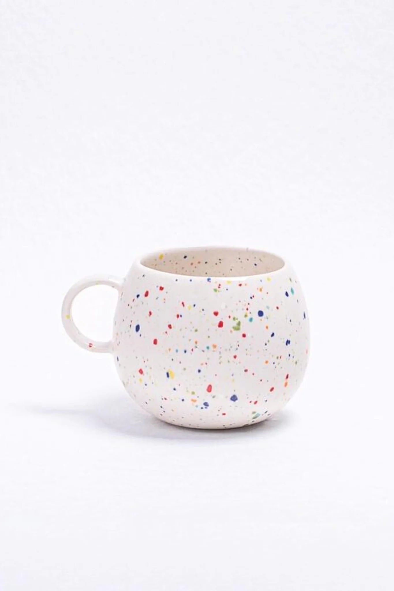 White stoneware mug, rainbow