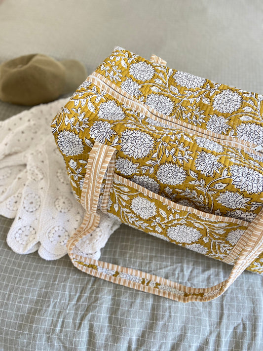 Quilted weekend bag in floral Indian fabric