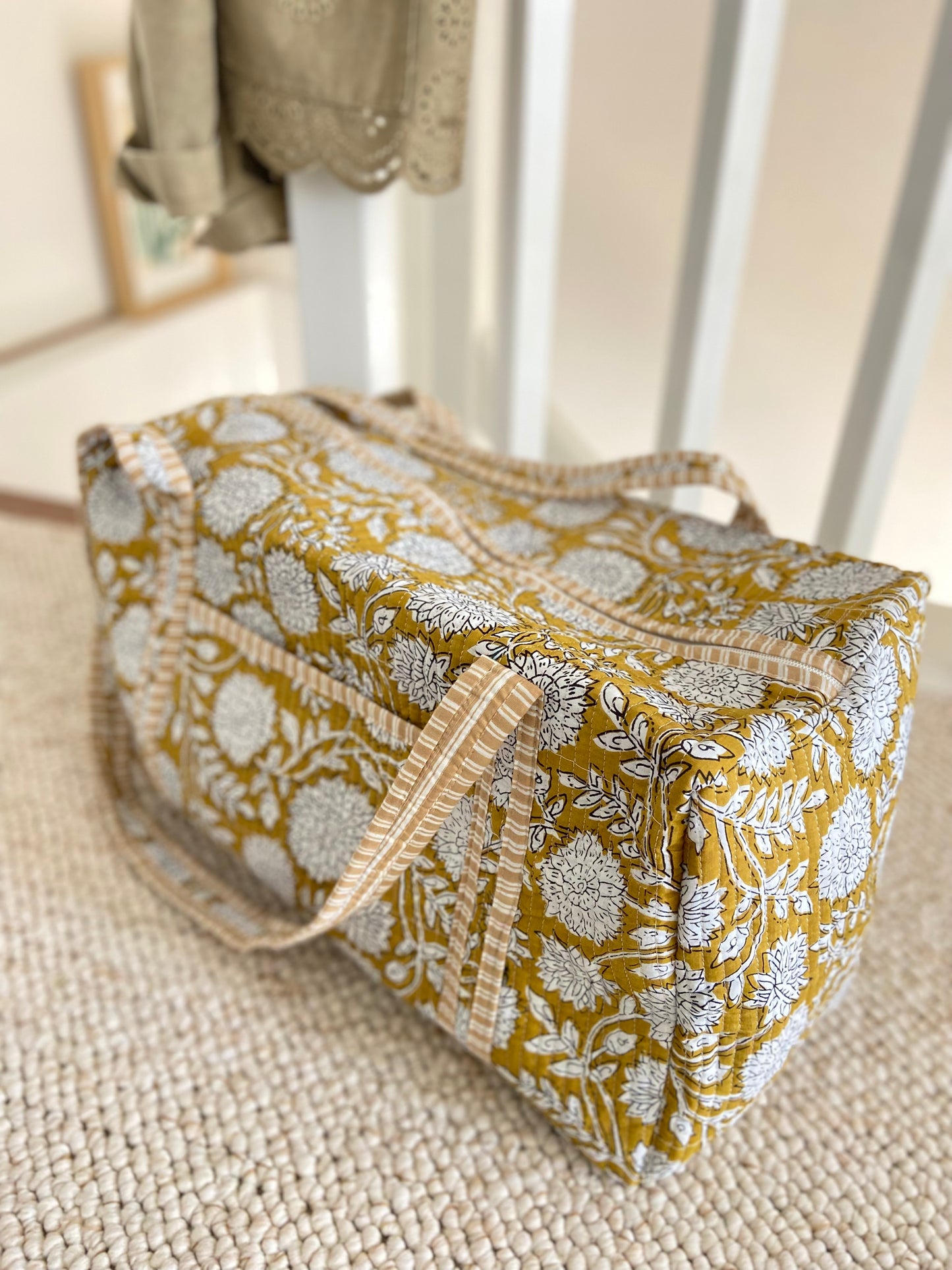 Quilted weekend bag in floral Indian fabric